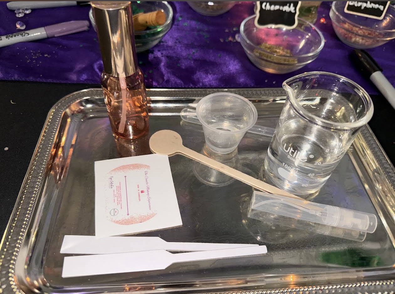 Perfume bottles and fragrance oils ready for a perfume-making class